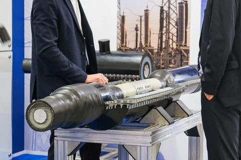 Engineer presenting heavy cable joint at professional electricity industry Stock-Fotos