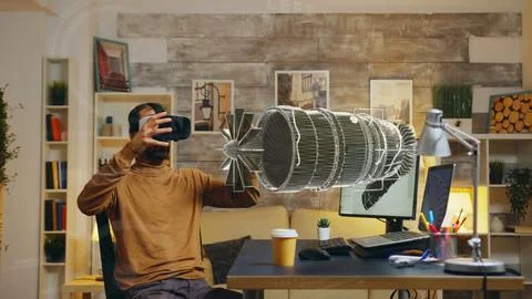 Engineer prototyping turbine using VR Stock Photos