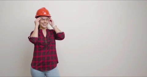 Engineer puts on her glasses for safety and says that everything is ok Stock Footage 280867490