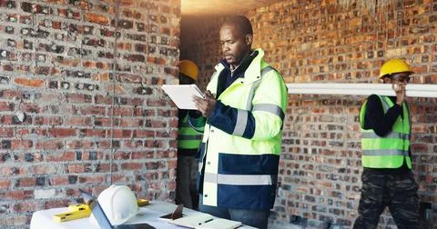 Engineer, reading and man tablet for construction, inspection and research .. Stock Photos
