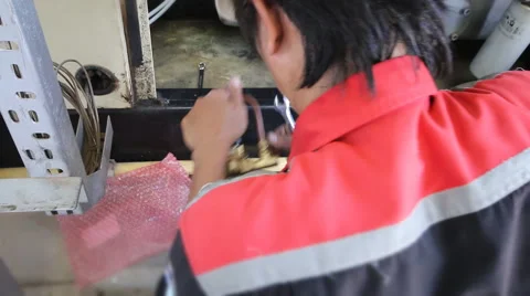 Engineer to repair part of engine Stock Footage 56443753