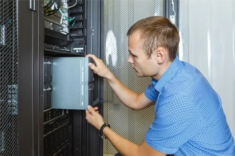 Engineer repair server Stock Photos