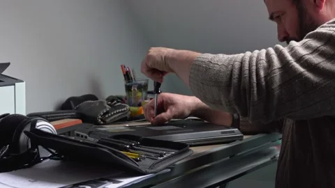 Engineer repairing laptop computer Stock Footage 231896754