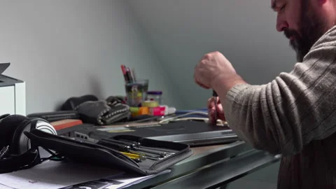 Engineer repairing laptop computer Stock Footage 249328903