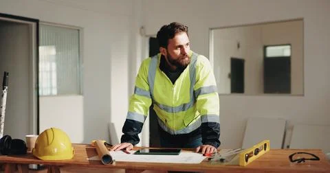 Engineer, review and thinking with man and blueprint for property surveyor Stock Photos