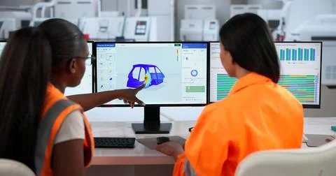 Engineer Reviews 3D Structural Simulation Data For Precise Semiconductor Manu Stock Photos