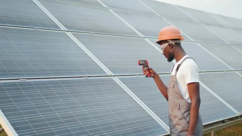 Engineer in safety helmet using thermal imager for measuring temperature heat of Stock Footage 168689175