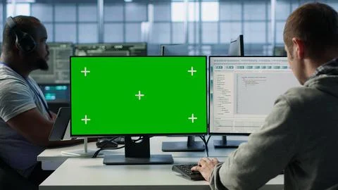 Engineer in server hub using mockup PC to repair equipment storing datasets 스톡 사진