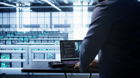Engineer in server hub works with artificial intelligence computerized model Video stock 277644414