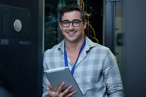 Engineer, server room and portrait of a man with a tablet for programming Stock-Fotos