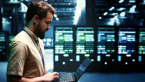 Engineer servicing VPN servers Stock Footage 246714659