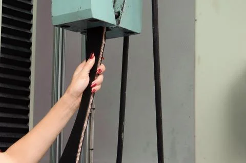 Engineer set up and testing old machine in factory Fotos de archivo