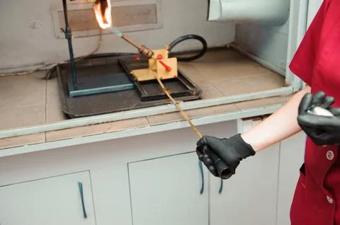 Engineer set up and testing old machine in factory Foto stock