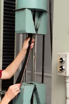 Engineer set up and testing old machine in factory, engineering and industrial Stock Photos