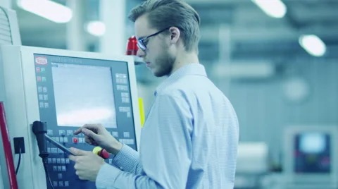 Engineer is Setting Up CNC Lathe Machine in Factory 스톡 동영상 45140049