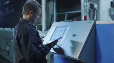 Engineer is Setting Up CNC Lathe Machine in Factory 스톡 동영상 47914365