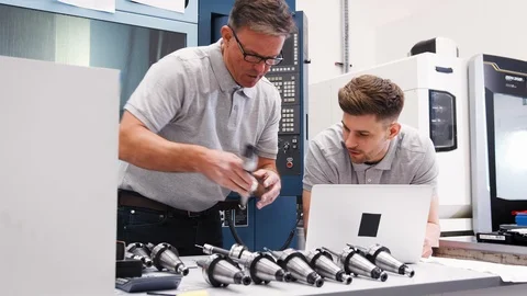 Engineer Showing Apprentice How Use CAD Software On Laptop Video stock 95508958