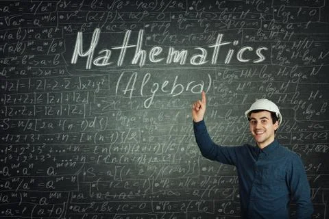 Engineer showing to blackboard formulas Stock Photos