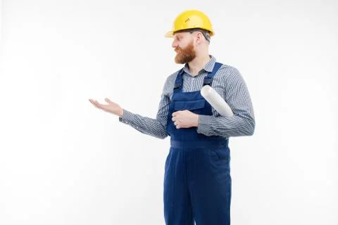 The engineer is showing something on a white background. Stock Photos