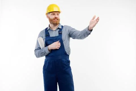 The engineer is showing something on a white background. Stock Photos