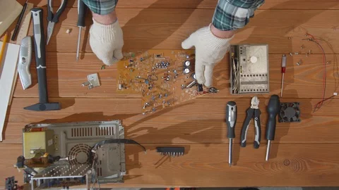 The engineer shows the board from the computer Stock Footage 129974276