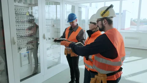 Engineer shows cases with equipment to skilled inspectors Video stock 144099321