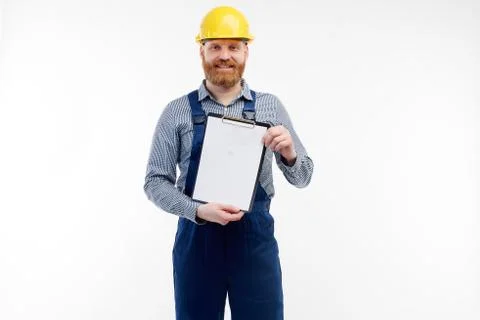 Engineer shows notepad on camera on a white background Stock Photos