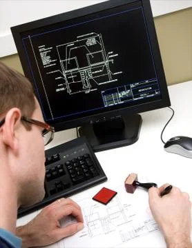 Engineer signing drawing Stock Photos