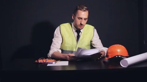 The engineer signs the documents and pays to the Secretary Stock-Footage 81268293