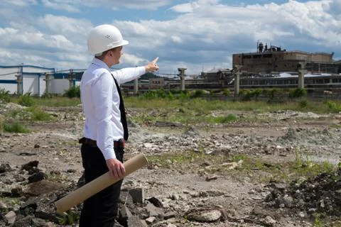 Engineer on site pointing something Stock Photos