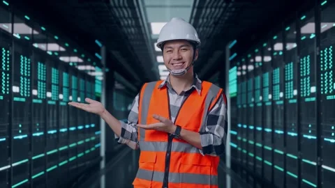Engineer Smiling And Pointing To Side in Data Center Video stock 321990775