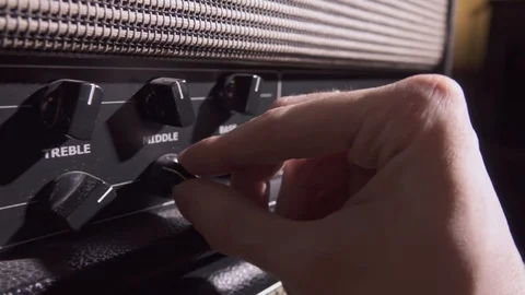 Engineer in sound recording studio adjust knobs, close-up Video stock 122585015