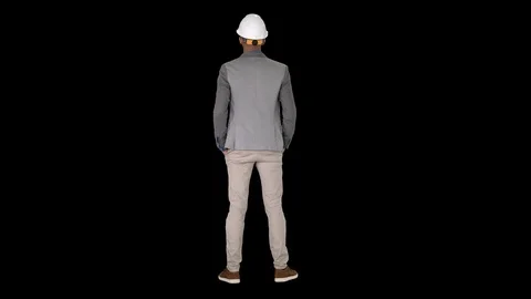 Engineer standing and looking around, Alpha Channel Stock-Footage 113737870