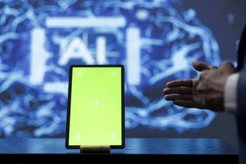 Engineer in startup doing advancements in AI field using mockup tablet, close up Stock Photos