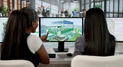 Engineer Studies 3D Digital Twin Model On Computer For Urban Planning. 写真素材