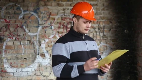 The engineer studies the working documents in the production. 스톡 동영상 73450929