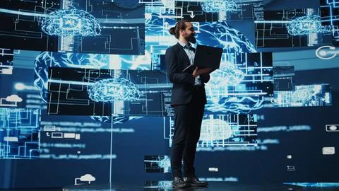 Engineer studying AI brain for data structures and predictive analytics Stock Photos