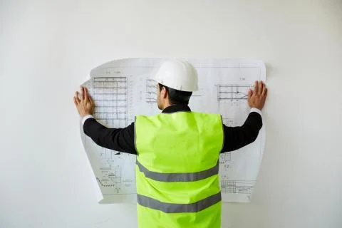 Engineer Studying Plans Stock Photos