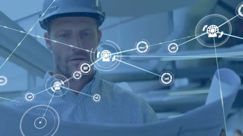 Engineer studying plans in plant, data icon popping, network expanding covering Stock Footage 334311965