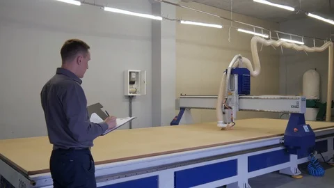 Engineer supervises the machine Stock Footage 92644200