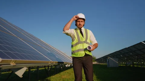Engineer Supervises Solar Panel Field Operations Stock-Footage 296847167