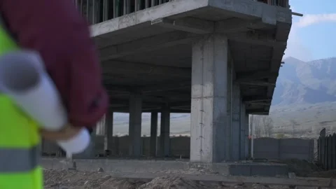 Engineer supervisor onsite to check and inspection construction process building Stock Footage 273494083