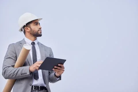 Engineer, tablet and man thinking at construction site for development with 스톡 사진