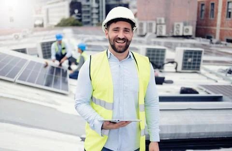 Engineer, tablet and working with solar panel, building and maintenance outdoor 写真素材