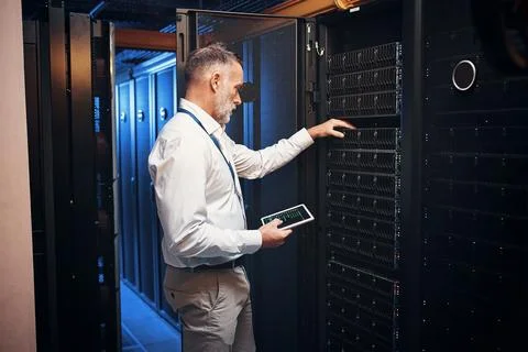 Engineer, tablet or hardware inspection in server room for system health, p.. Stock Photos