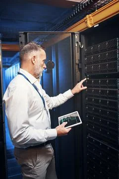 Engineer, tablet or rack inspection in server room for system health, hardw.. Stock Photos
