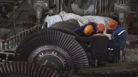 Engineer taking notes for maintenance steam turbine of thermal power plant Stock Footage 83800860