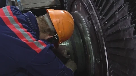 Engineer taking notes for maintenance steam turbine of thermal power plant Stock Footage 83800891