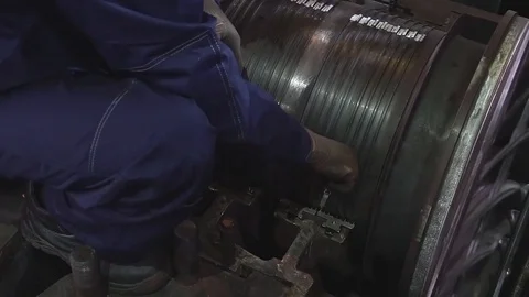 Engineer taking notes for maintenance steam turbine of thermal power plant Stock Footage 83800937