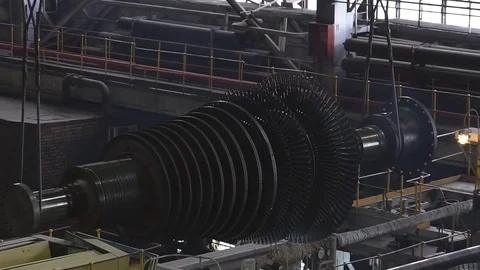 Engineer taking notes for maintenance steam turbine of thermal power plant Stock Footage 83801081